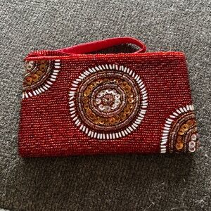 Fully beaded wristlet red white and copper with zipper closure